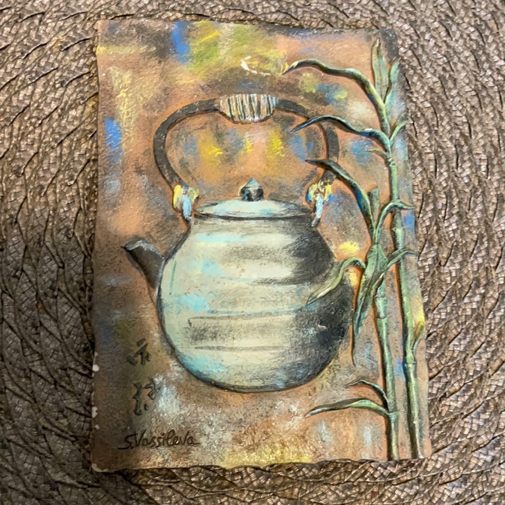 # Vintage Tail with kettle and flowers.